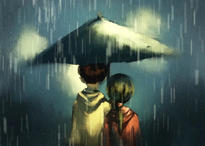 Two people under umbrella in rain